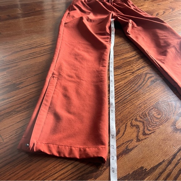 New Balance men’s orange wind breaker style pants size small - Picture 2 of 9